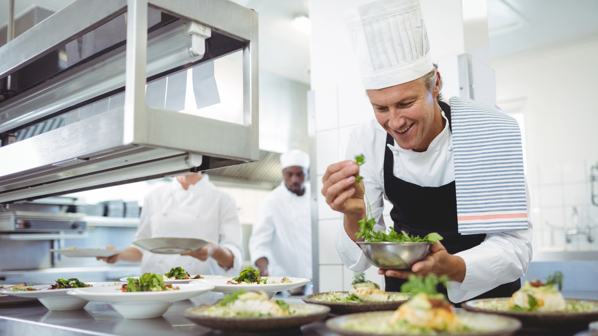 foodservice interim chef team kitchen preparing food dishes